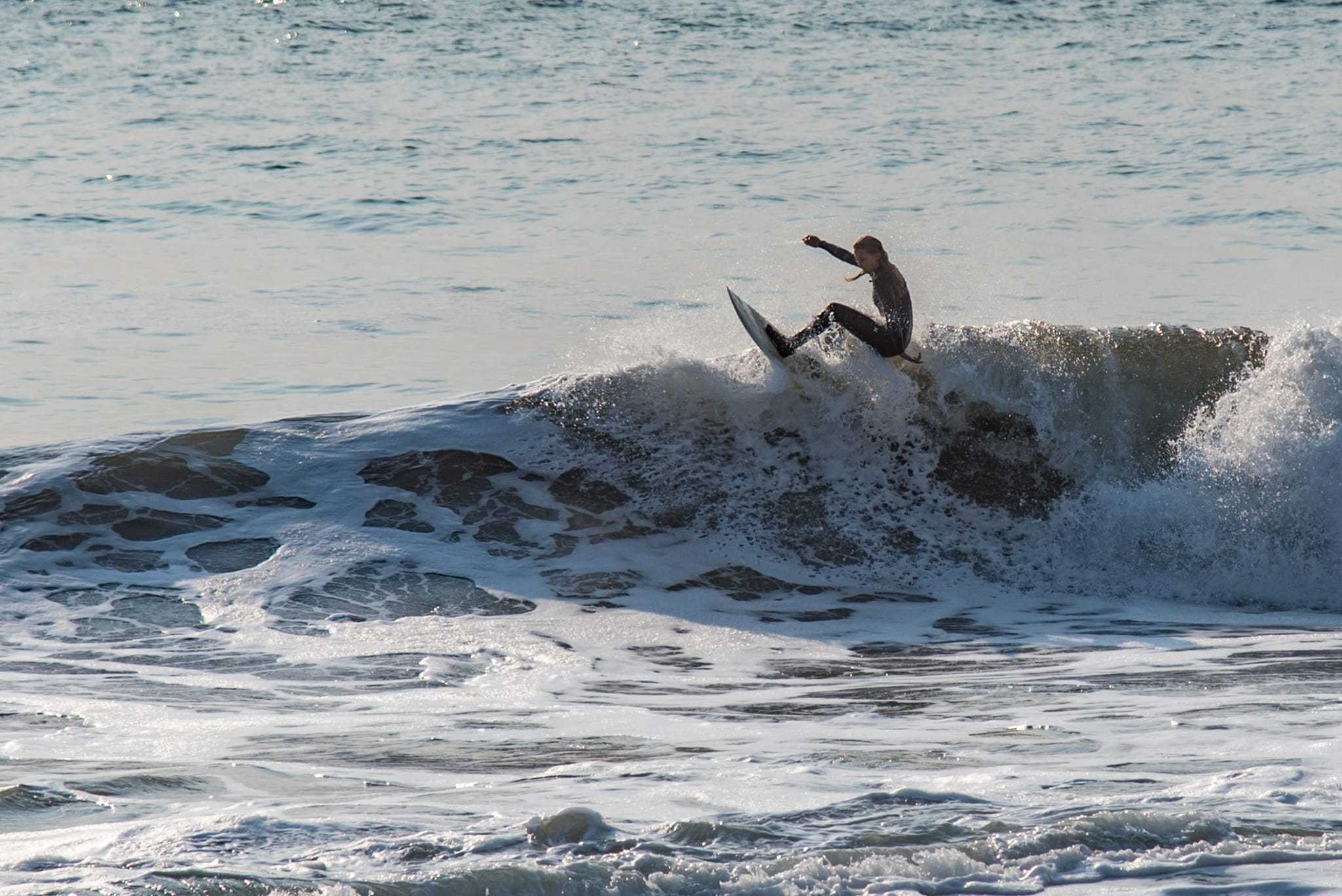 Female Surfer at Rodeo Cove